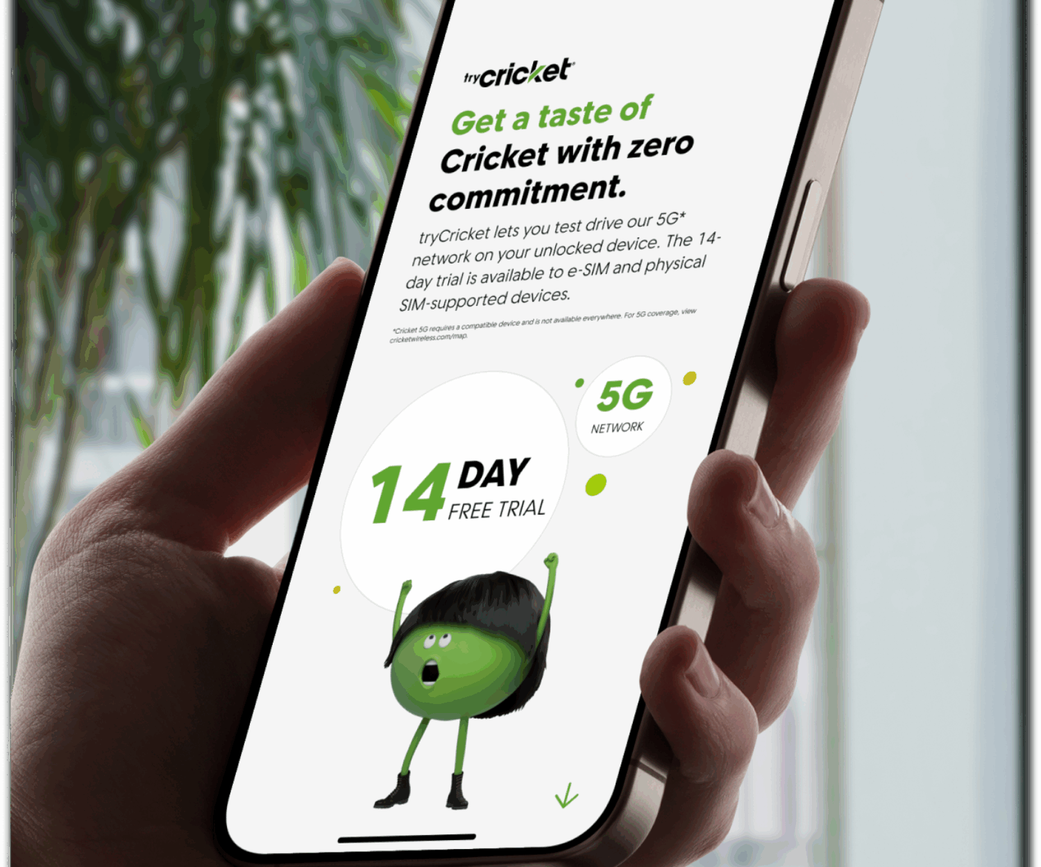 Holding a iPhone with tryCricket featured